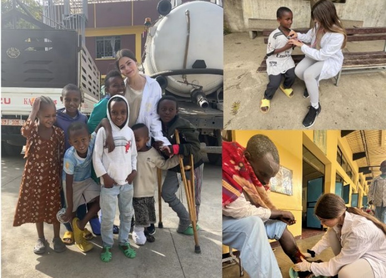 student helping the locals in Ethiopia